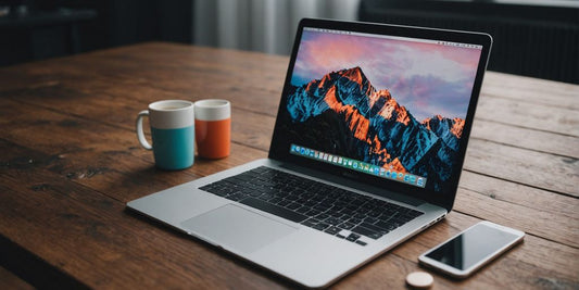 Different MacBook Air shells displayed on a wooden table