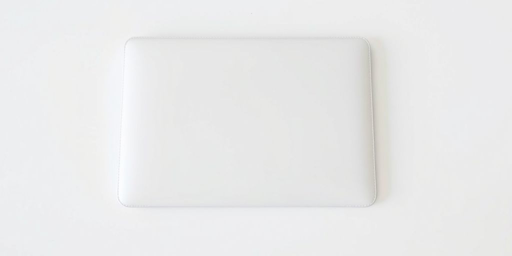 Minimalist MacBook Air sleeve on a clean surface.